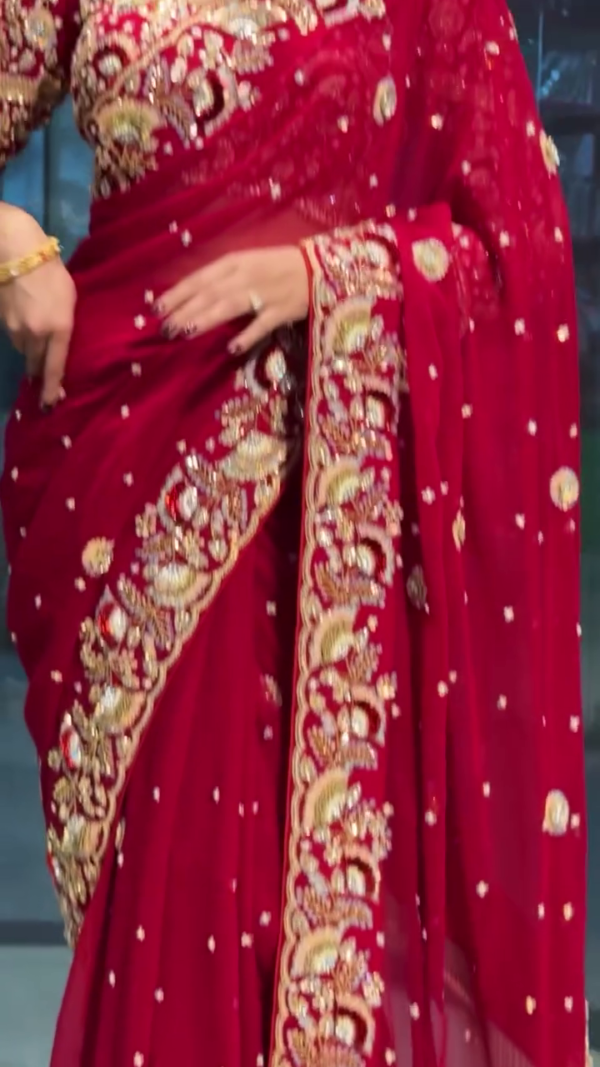 Radiant Beauty: Red Bridal Saree with Golden Embroidery - Image 4