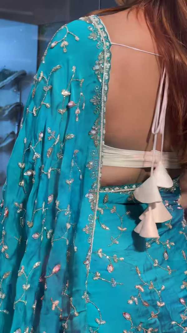 Elegant Turquoise Sari Adorned with Delicate Silver Embroidery - Image 3