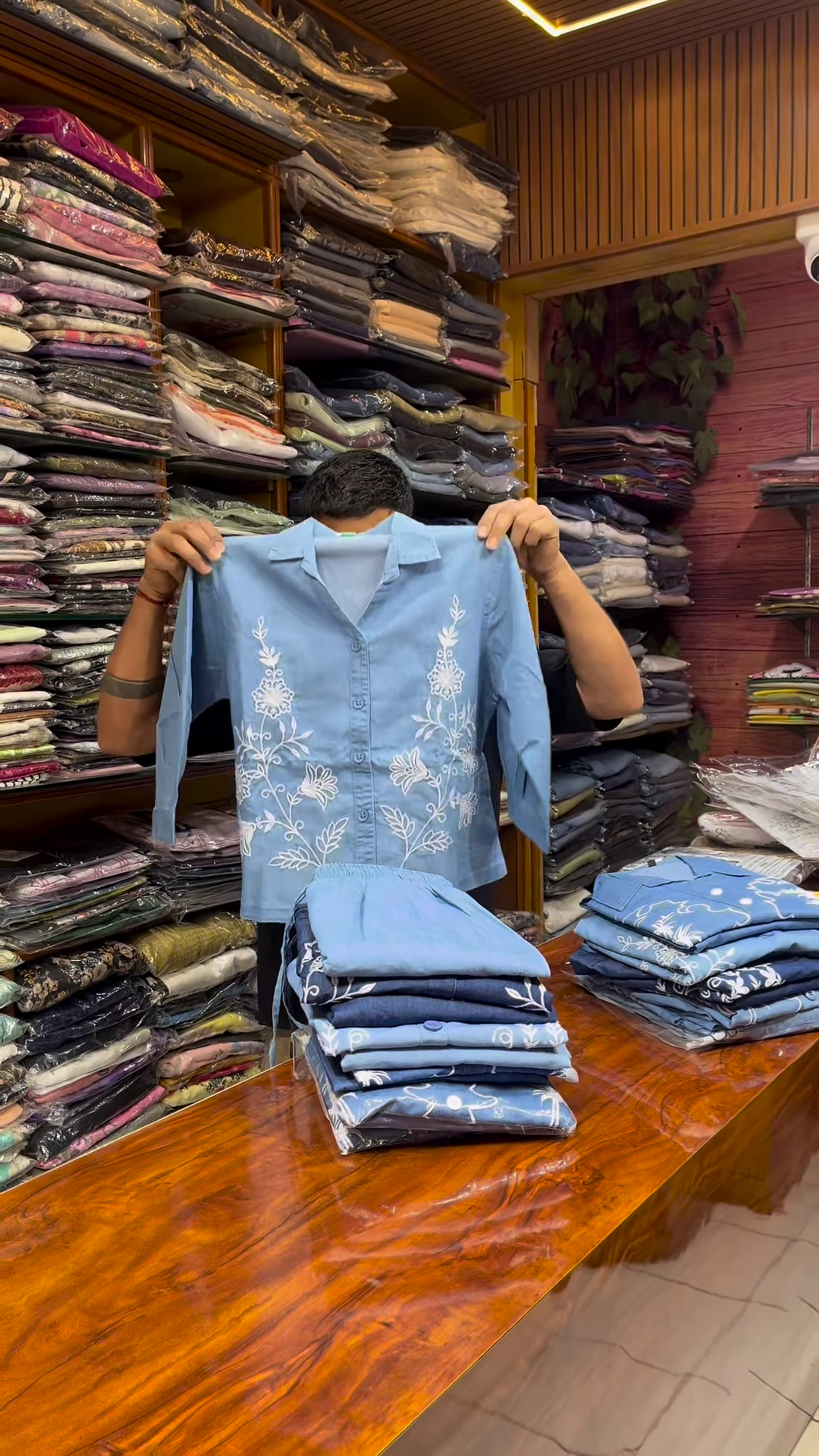 Light Blue Long-Sleeve Shirt with White Floral Embroidery and Button-Front Closure - Image 7