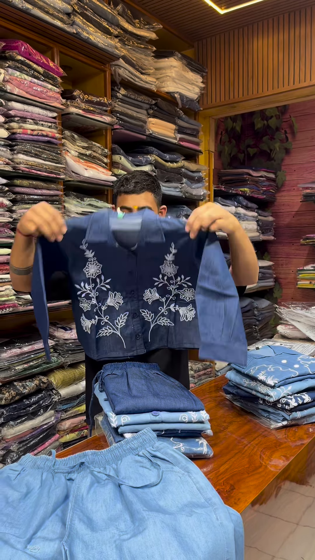 Light Blue Long-Sleeve Shirt with White Floral Embroidery and Button-Front Closure - Image 5