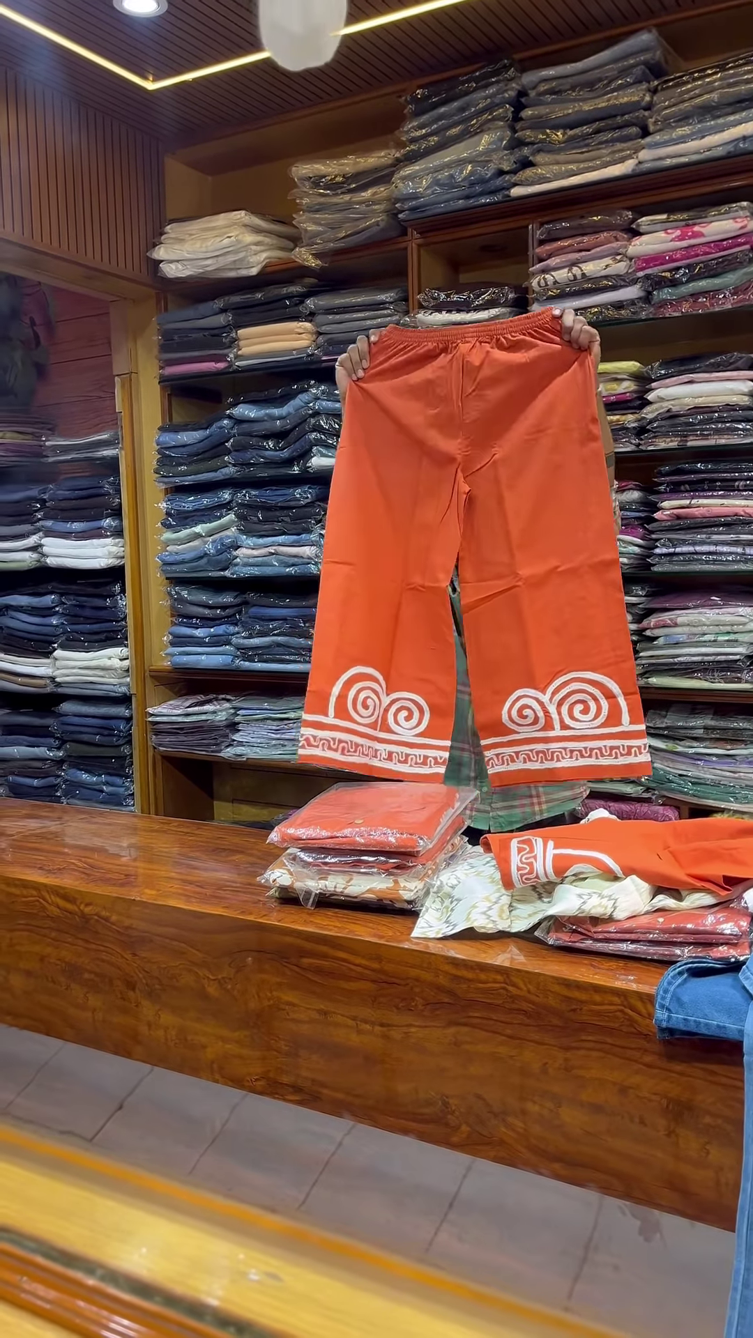 Orange Sleeveless V-Neck Vest with White Embroidered Edges and Button Closure - Image 6