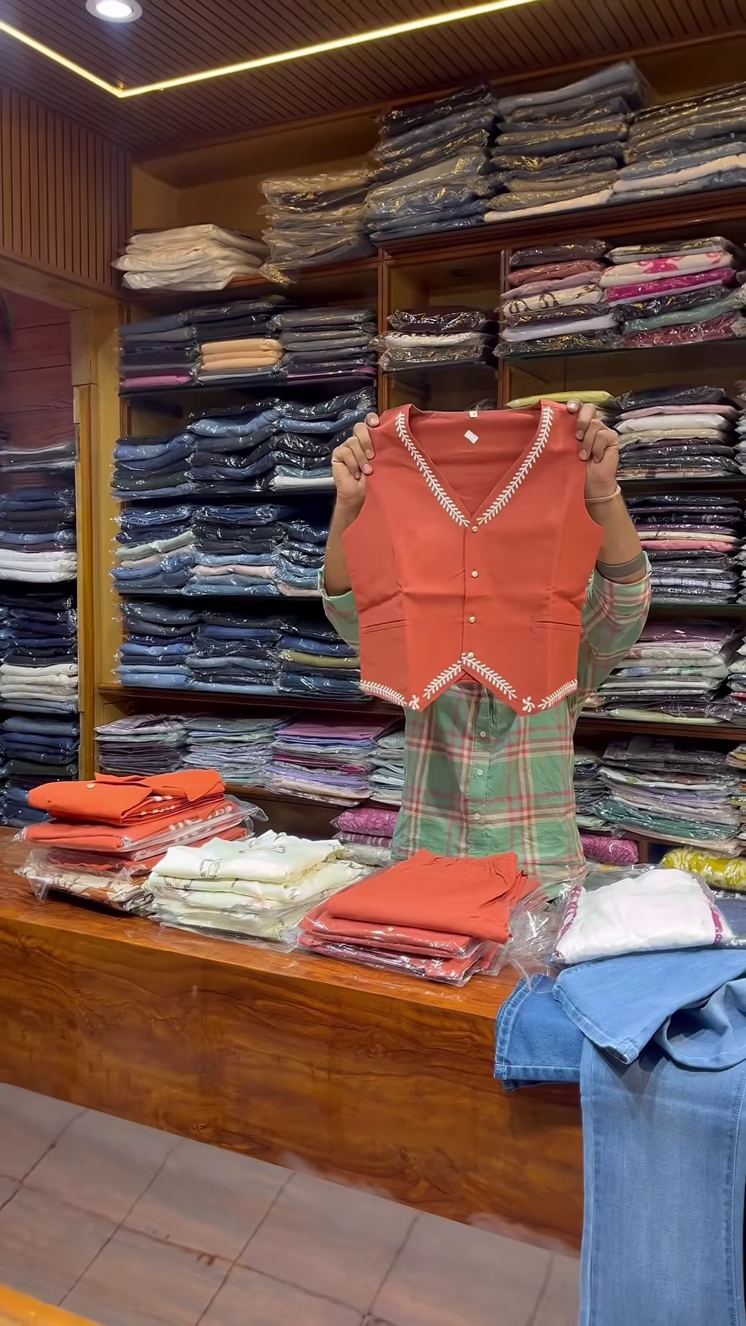 Orange Sleeveless V-Neck Vest with White Embroidered Edges and Button Closure - Image 5