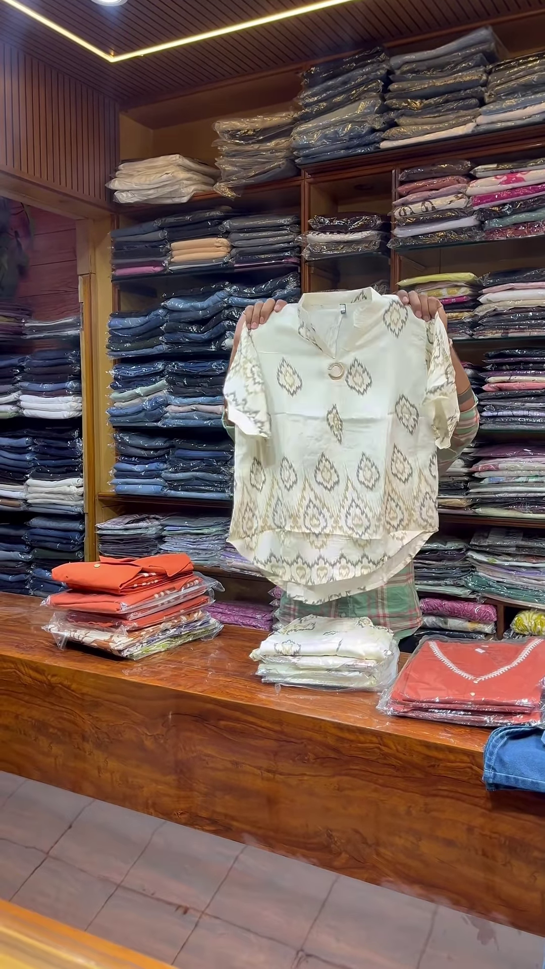 Orange Sleeveless V-Neck Vest with White Embroidered Edges and Button Closure - Image 3