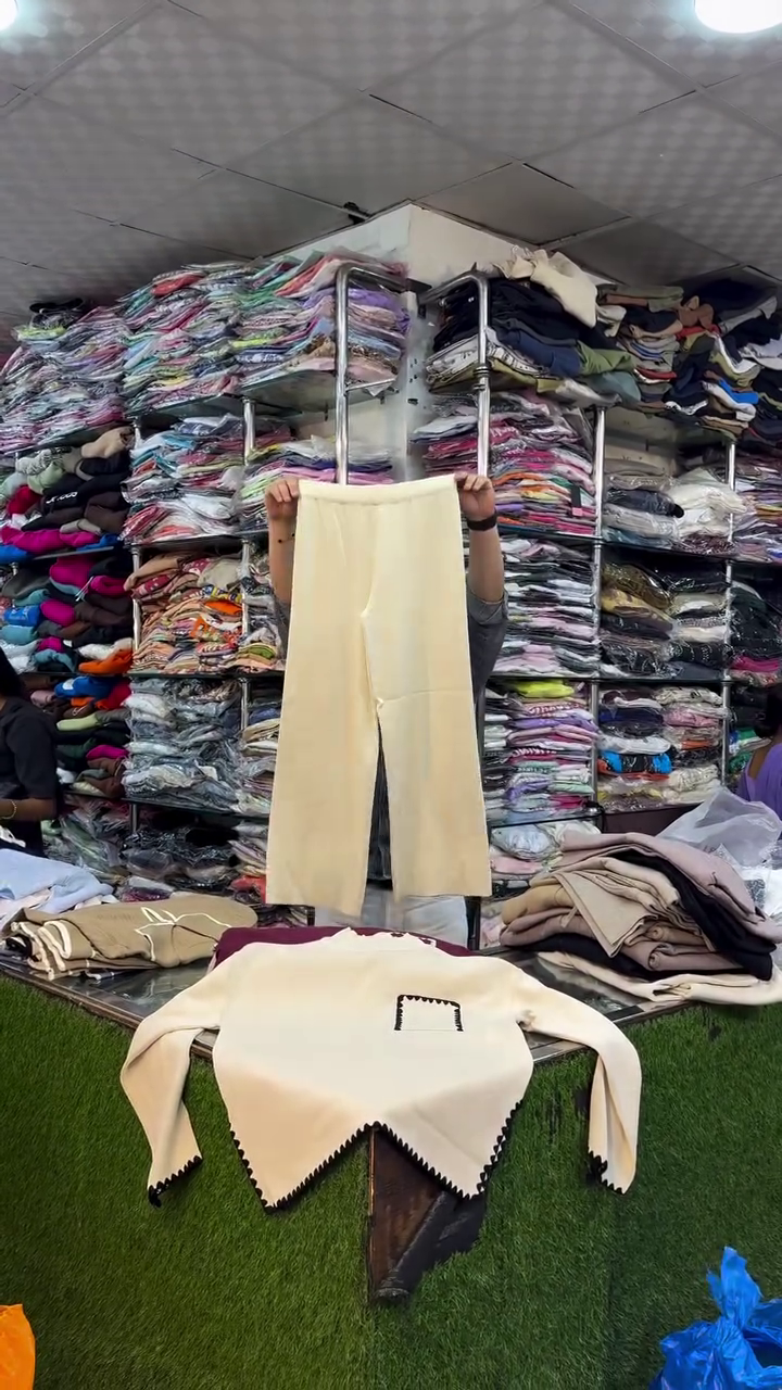 🧵 "Minimalist Modern Café Cream Knit Top with Artistic Black Scalloped Accents and Pocket Detail for Everyday Sophistication Seekers" 🧵 - Image 2